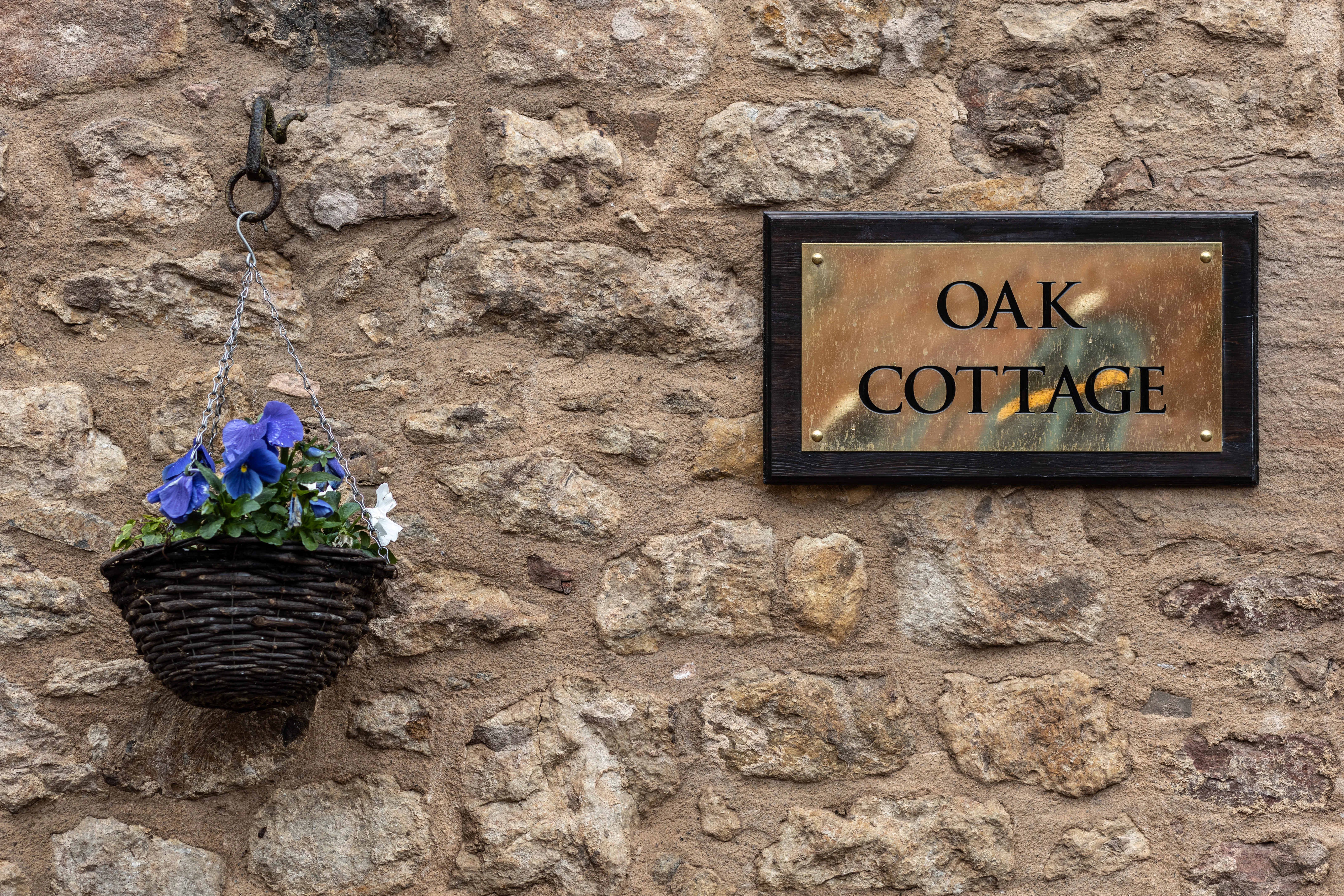 Oak Cottage nameplate at Broxmouth Courtyard.